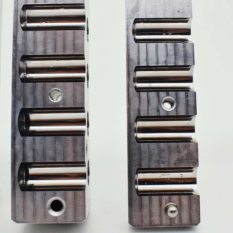 Close view of the polished flat-top lipstick cavity components