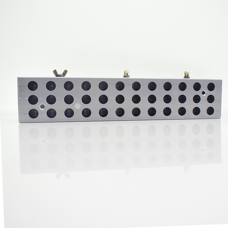 Top view showing all 36 holes of the bird-beak lipstick mold