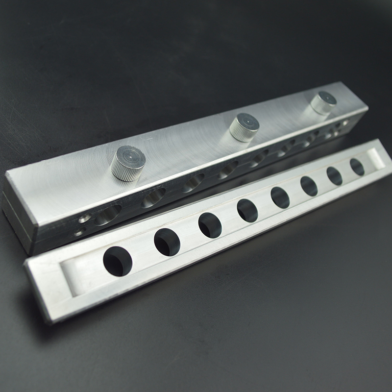 Open 8-cavity blush stick mold showing the forming parts